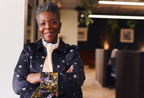 Senior woman smiling in office