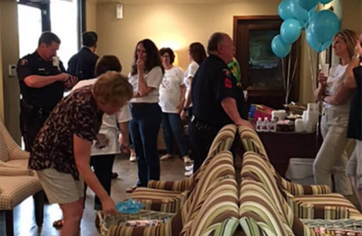 Community members and police officers attending coffee with a cop event