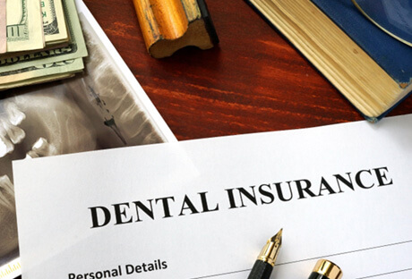dental insurance form on table