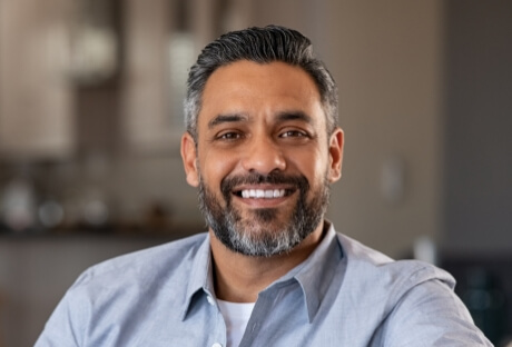 Smiling man with dental implants