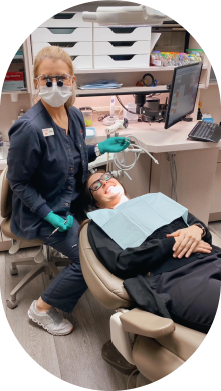 Dentist treating dental patient