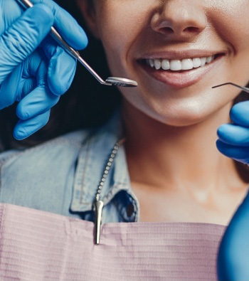 Dentistry patient's smile during dental checkup