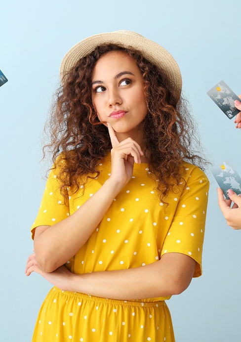 Woman surrounded by credit cards