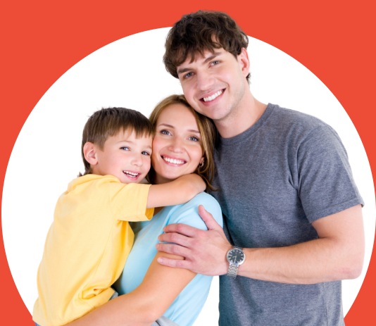 Family of three smiling together