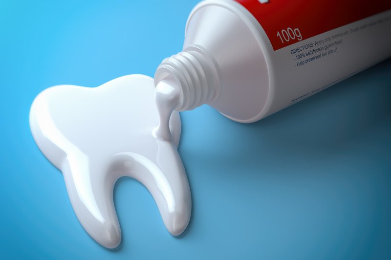 fluoride pouring into the shape of a tooth